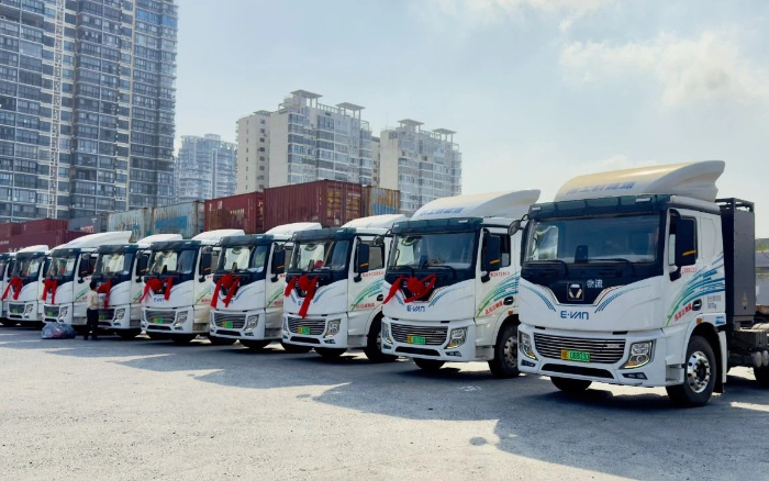 百台交付 | 开云电子·「中国」官方网站新能源重卡绿动海南