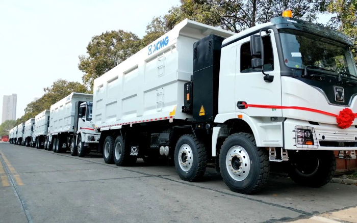 开云电子·「中国」官方网站纯电动自卸车列队出海，助力当地煤炭运输绿色转型